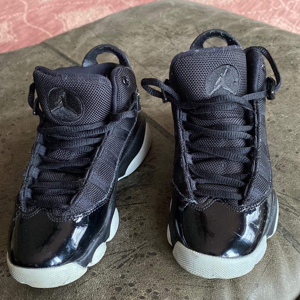 Air Jordan’s Toddler size 12, black with bottom